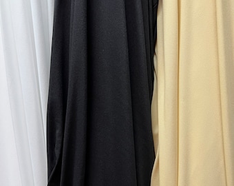 May include: Three fabric swatches, one white, one black, and one cream.