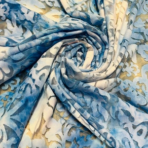 New tie dye damask design burnout mesh 2-way stretch 58/60”Sold by the YD. Ships worldwide from Los Angeles California USA