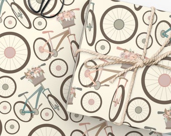 Rol inpakpapier voor fietsen. Vrouwelijke manden vol bloemen en zachte pastelkleurige wieltjes, verjaardagen voor fietsliefhebbers, moederdag