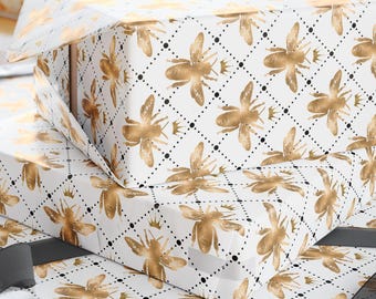 Golden Queen Bee Wrapping Paper, Unleash your inner queen with our Honey Bee Gift Wrap, Adorned with dainty gold crowns, Regal Elegance
