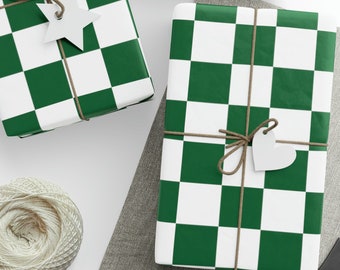 May include: Presents wrapped in green and white chequered paper, tied with twine and decorated with white star and heart-shaped tags. A ball of twine, scissors, and blank tags are also visible.