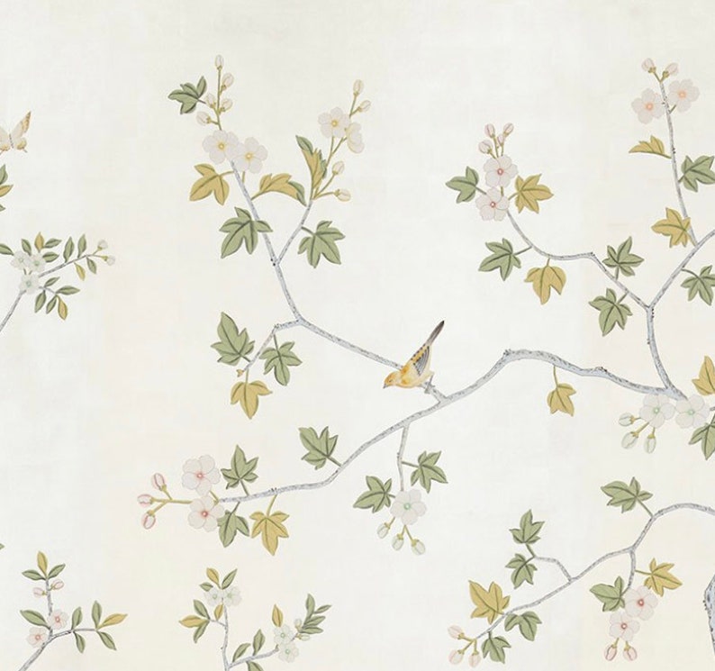May include: A white background with a delicate floral pattern featuring white flowers and green leaves. A small yellow bird sits on a branch.