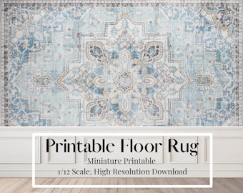 May include: A digitally created floor rug with a detailed, ornate pattern in shades of blue, cream, and gold. The rug design features a central medallion and intricate border. Text at the bottom reads "Printable Floor Rug" and "Miniature Printable".