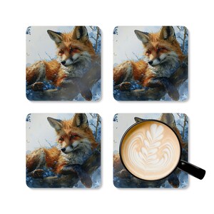 May include: Set of four square coasters featuring a red fox with a white chest and tail, lying on a branch with blue flowers. The fox is looking to the right. The background is a light blue watercolor wash.