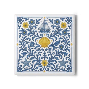 May include: A blue and yellow square tile with a nautical theme. The tile features a sailboat, a seashell, and starfish surrounded by blue floral designs.