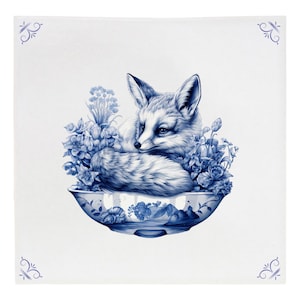 May include: A blue and white porcelain bowl with a fox curled up inside. The bowl is decorated with floral designs and the fox is surrounded by flowers.