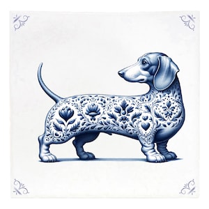 May include: A blue and white decorative tile featuring a dachshund dog. The dog's body is adorned with intricate floral patterns. The tile has a white background with blue corner designs.