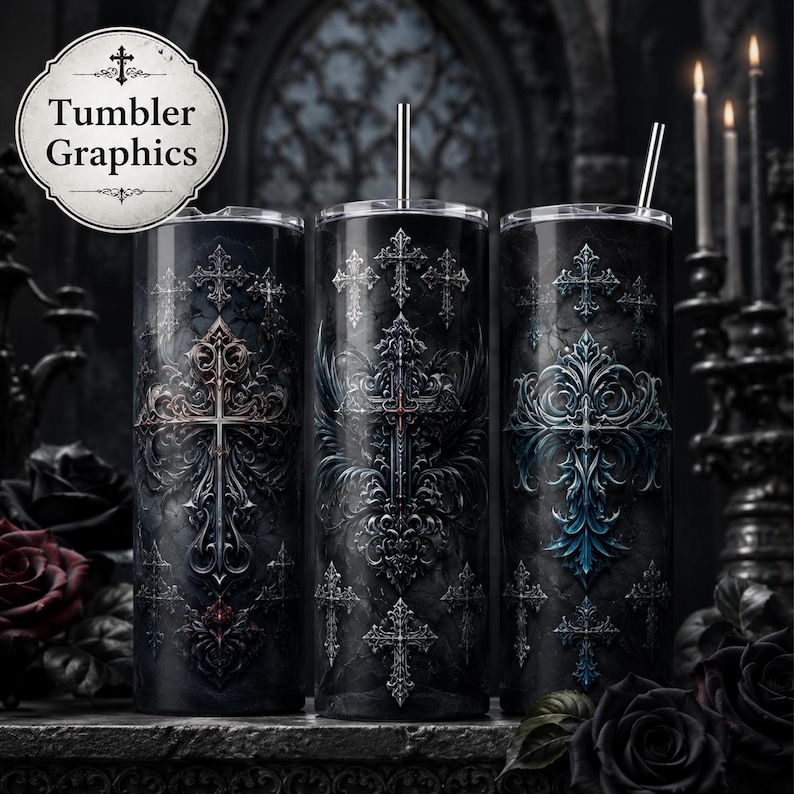 May include: Three cylindrical tumblers with metal straws, each featuring a dark, gothic-inspired design with intricate, ornate cross motifs in shades of black, grey, and blue. A circular logo in the top left corner displays the text Tumbler Graphics.