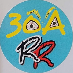 May include: A blue circle sticker with the text "30A" in yellow with two red eyes and the text "KR" in black and red.