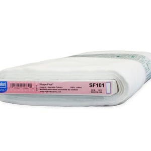 May include: White cotton Shape-Flex Apparel Specialty Fabric roll with the label "SF101 20 in. 2012 Made in USA".