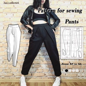 Pode incluir: Um padrão de costura para calças, com uma ilustração branca das calças à esquerda e um padrão preto e branco à direita. O padrão é para os tamanhos XS a XL. O texto "Pattern for sewing Pants" está no topo da imagem.