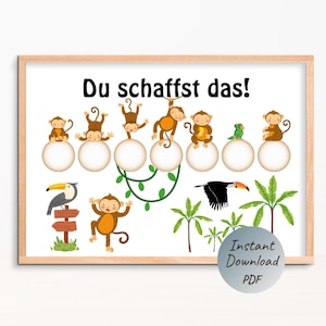 Peut inclure: Une affiche encadrée avec des singes, des oiseaux et des plantes tropicales de dessins animés. La phrase allemande "Du schaffst das!" est affichée en haut. L'image comprend un toucan, un perroquet et un poteau indicateur. Un graphique circulaire indique un téléchargement PDF instantané.