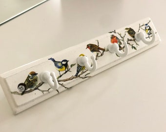 Wooden Key Holder.  Featuring Decoupage Garden Birds.  Four white hooks to keep your keys safe.