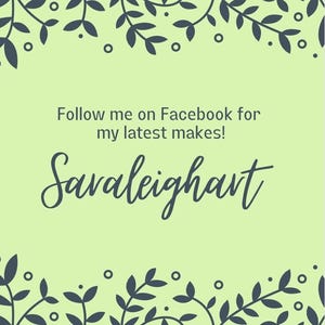 May include: A light green background with a dark blue floral border. The text 'Follow me on Facebook for my latest makes!' is in dark blue text. The text 'Saraleighart is in a large, dark blue, cursive font.