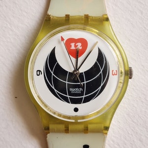 Swatch Vintage Globe Heart Girl Swiss Quartz Watch