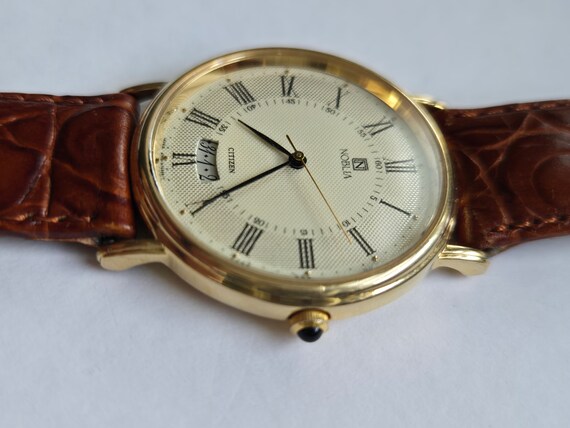 Black Gold Noblia llysine Citizen Quartz