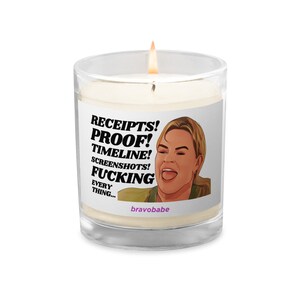 May include: A white candle in a glass jar with a label that says "RECEIPTS! PROOF! TIMELINE! SCREENSHOTS! FUCKING EVERYTHING..." and a cartoon image of a woman with blonde hair and a surprised expression. The label also has the text "bravobabe" at the bottom.