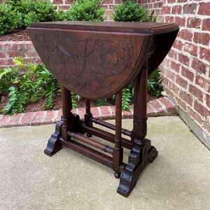 Antique English Table Drop Leaf Gateleg Turned Post Carved Top Trestle Base Oak