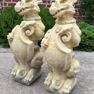 Vintage English Statues Garden Figures Gargoyles Shield Cast Stone Pair