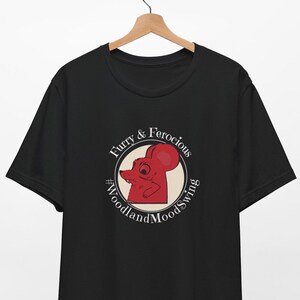 May include: Black t-shirt with a red cartoon mouse graphic. The graphic is in a circle with the text "Furry & Ferocious #WoodlandMoodSwing".