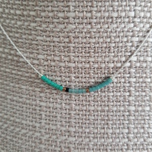 Tiny and delicate, colorful sterling silver seed bead necklace.