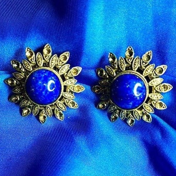 Boucles d’oreilles vintage clip année 40 en forme de soleil