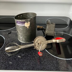 Vintage Bromwell 3 cup Flour Sifter,Mouli Cheese Grater, and a Taplin Mfg Egg Beater