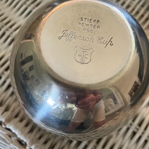 May include: Silver Jefferson Cup by Steiff Pewter, marked P50 with the ATC logo.