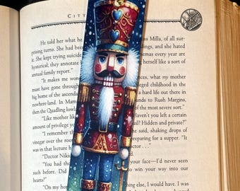 Marcapáginas con lazo rosa: elegancia artesanal para su placer de lectura