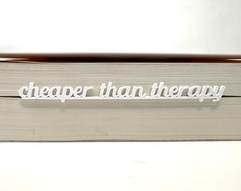 Más barato que la terapia. Incluye marcapáginas multicolor.