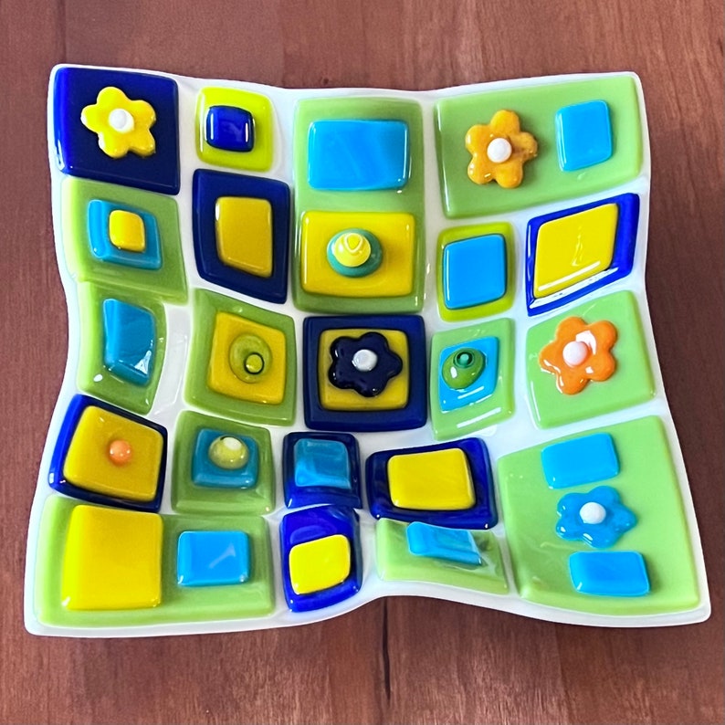 Fused glass art dish. Colorful art glass bowl. Geometric shapes on a handmade dish. Flowers. Fluted glass dish. Entertaining dishes. Foodie gift. Gift for mom. Green and blue dinnerware. Cottage core. Anniversary gift. Limited Edition.