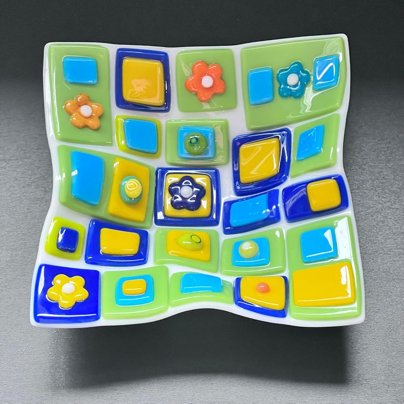 Fused glass art dish. Colorful art glass bowl. Geometric shapes on a handmade dish. Flowers. Fluted glass dish. Entertaining dishes. Foodie gift. Gift for mom. Green and blue dinnerware. Cottage core. Anniversary gift. Limited Edition.