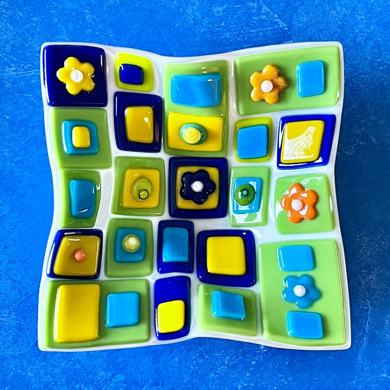 Fused glass art dish. Colorful art glass bowl. Geometric shapes on a handmade dish. Flowers. Fluted glass dish. Entertaining dishes. Foodie gift. Gift for mom. Green and blue dinnerware. Cottage core. Anniversary gift. Limited Edition.