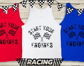 May include: Three tank tops with the phrase "Start Your Engines" printed in black with a checkered flag graphic. The tank tops are red, white, and blue.