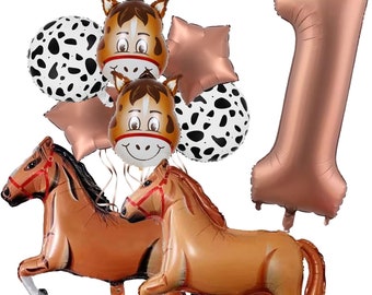 May include: A collection of party balloons in a horse theme. Includes two brown horse-shaped balloons, two horse face balloons, two star-shaped balloons, two dalmatian print balloons, and a large number one balloon in rose gold.