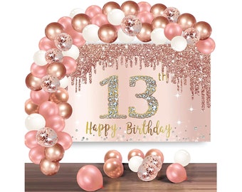 May include: A pink and gold glitter backdrop with the number 13 in sparkly diamonds and the text "Happy Birthday". The backdrop is decorated with a garland of pink, gold, and white balloons.
