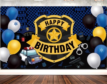 May include: A blue and black police-themed birthday banner with a gold badge that says "Happy Birthday". The banner features a police car, handcuffs, and balloons.