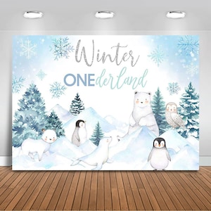 May include: A blue and white winter wonderland themed backdrop with the text "Winter ONEderland". The backdrop features a polar bear, penguins, a seal, and an owl in a snowy landscape.