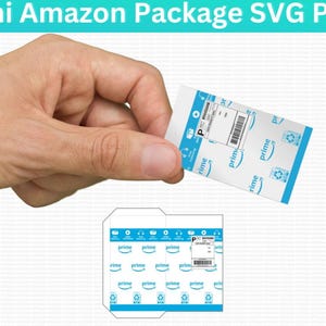 May include: A miniature Amazon package with a blue and white design featuring the word "prime" repeated multiple times. The package is held in a hand.