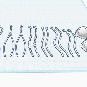 May include: A set of 10 white plastic chain links and two white plastic dome-shaped pieces. The chain links are in various shapes and sizes, including straight, curved, and wavy.