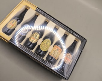 6 small bottles of Guinness in excellent condition Lilliput Bolttlers