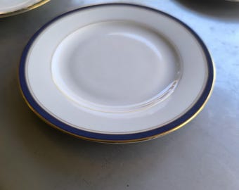 8 Porzellanteller aus Limoges, Frankreich.