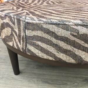 Modern mid table, Round floor table, Ottoman coffee table, Brown zebra bench, Handmade furniture, Stylish saloon decor, Chic table, DCY 765