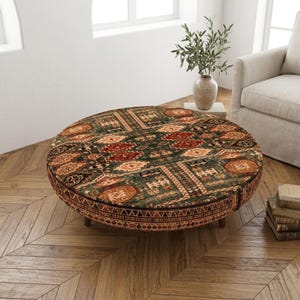 Mesa de centro tribal verde / Otomana redonda de salón con estampado étnico oscuro