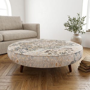 Mesa de centro redonda tapizada / Otomana de salón con motivo de mandala en color verde azulado y beige