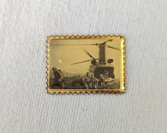 Objetos de recuerdo de sello de la guerra de Vietnam de latón vintage