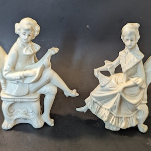 RARE Antique Dresden Germany White Porcelain Sitting Man and Lady Figurine Set With Red Eyes