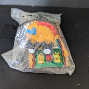 Jouet repas Burger King Kids Club vintage dinosaure orange