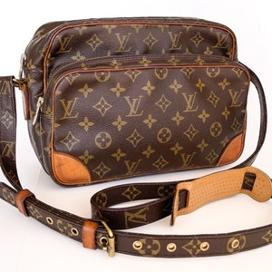 Louis Vuitton Utility Phone Sleeve Monogram in Coated Canvas with