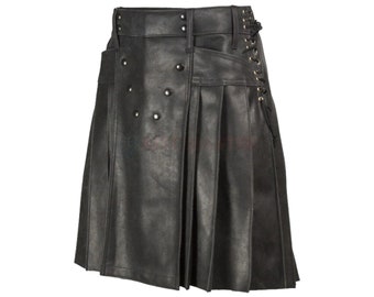 May include: A black leather kilt with a pleated skirt and a lace-up detail on the side. The kilt has a belt with metal buttons and a flap pocket on the front.